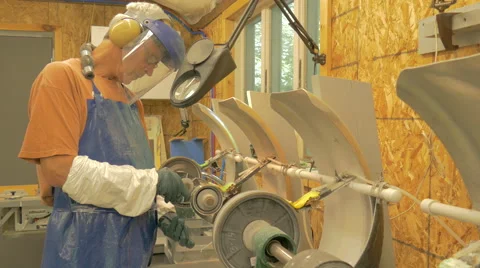 Man Grinding Glass Stockbeeldmateriaal 54050449