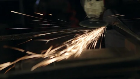 A man grinding in his workshop. Close up. High definition video. Stockbeeldmateriaal 88354083