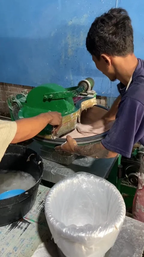 A man is grinding meatballs Stock Footage 276569082