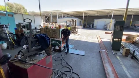 Man Grinding Metal Stock Footage 196009792