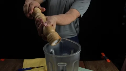 Man grinding pepper Stock Footage 118019809