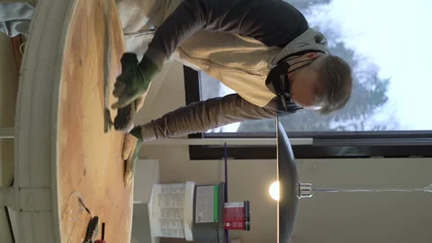 Man grinding the surface of an old table. Stock Footage 263257954