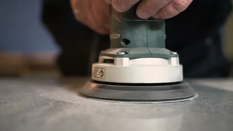 Man Grinds Stone Slab Close up with a Grinding Stone with Grinding Stone Stock Footage 93765563