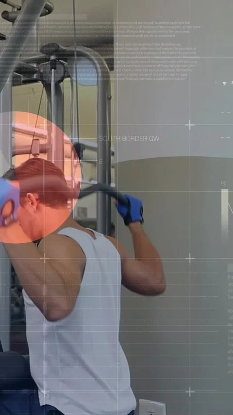 Man gripping bar and doing pulldown for lats in gym, while left HUD overlays Stock Footage 330965277
