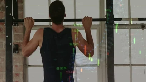 Man gripping bar doing pull-ups in loft causing candles tracking markets then Stock Footage 323456233