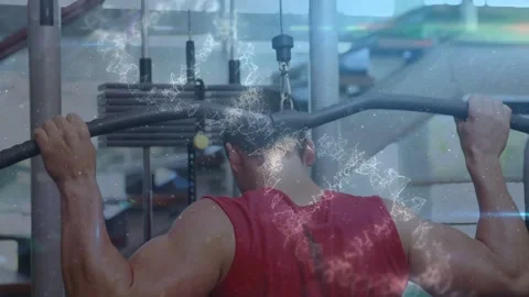 Man gripping gym lat pulldown bar and doing behind-neck reps causing spark Stock Footage 333287715