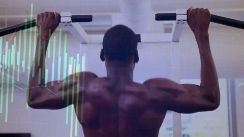 Man gripping pull-up bar and performing pull-ups in gym, animated data bars Stock Footage 323372761