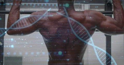 Man gripping pull-up bar and performing pull-ups in gym with DNA helix tracing Stock Footage 331276242