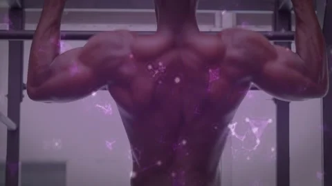 Man gripping pull-up bar at gym, pulling upward while purple particles showing Stock Footage 323407826