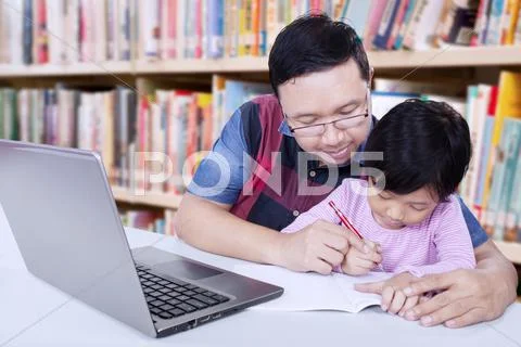 Man Guide A Girl To Write On The Book