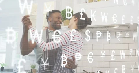Man guiding partner in slow kitchen dance after locking eyes, with floating Stock Footage 317793881