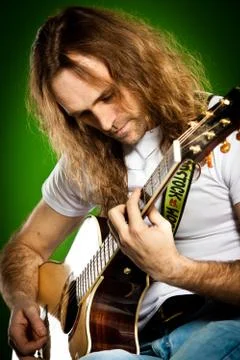 Man with a guitar Stock Photos