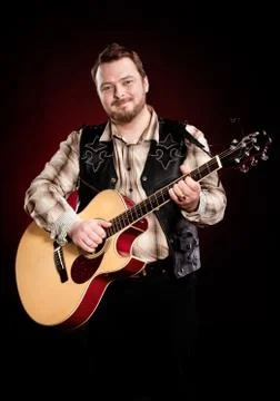 Man with a guitar Stock Photos