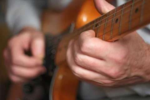 Man with guitar Stock Photos