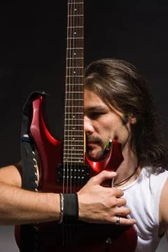 Man with a guitar Stock Photos