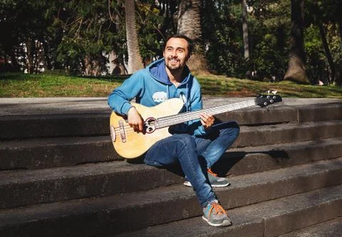 Man with guitar Stock Photos