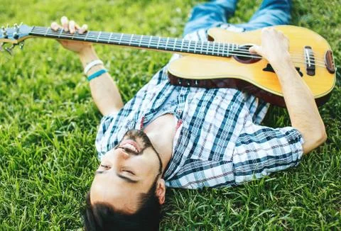 Man with guitar Stock Photos