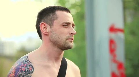 The man with the guitar standing on the bridge Stock Footage 50296478