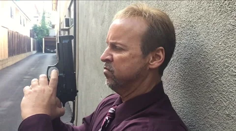 Man with gun 240 frames a second Stock Footage 49157249