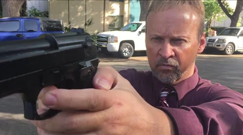 Man with gun 240 frames a second Stock Footage 49157435