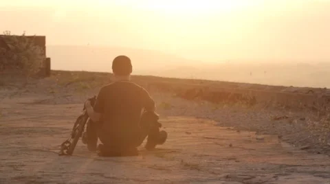 A man with a gun dawn Stock Footage 62559076