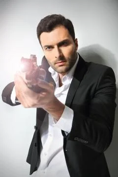 Man with a gun, isolated Stock Photos