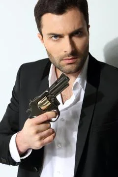 Man with a gun 스톡 사진