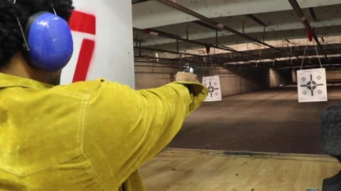 Man at the Gun Range Video stock 142247944