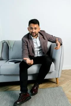Man guy in studio businessman gesturing Stock Photos