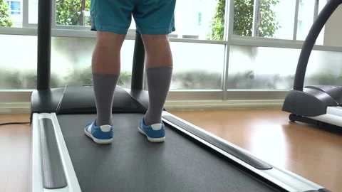 A man at the gym on the treadmill Stock Footage 91524406