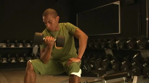 Man in a gym weight training Stock Footage 11300898