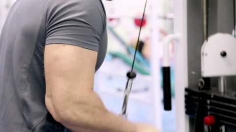Man At The Gym_ Training Triceps Hands With Stock Footage 34184309