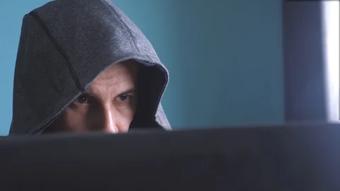 Man hacker in the hood concept. unknown hacker lifestyle criminal breaks into 動画素材 103752135