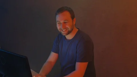 Man hacker tries to enter the system using codes and numbers. Stock Footage 90979596