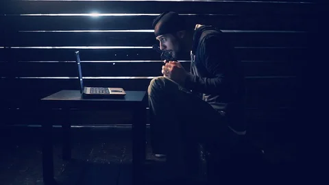 Man the hacker works behind the computer Stock Footage 88666852
