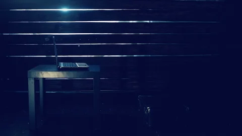 Man the hacker works behind the computer Video stock 94493810