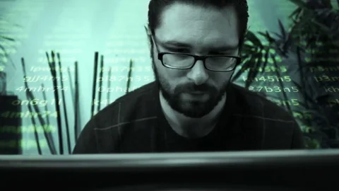 Man hacking code into computer Stock Footage 70284319