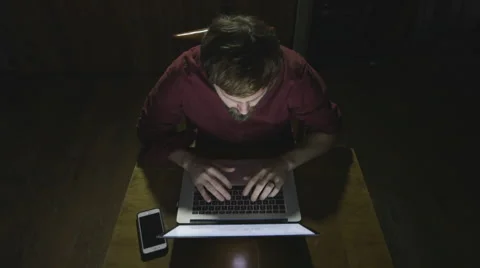 Man hacking computer aerial shot Stock Footage 44350895