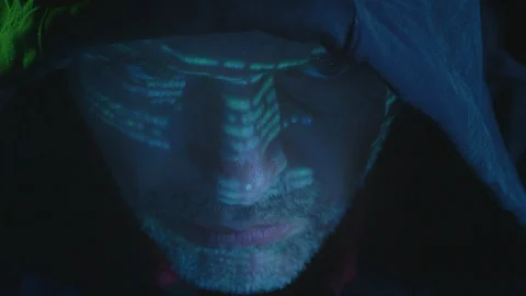 A Man Hacking A Computer in Dark Room Stock Footage 124792908
