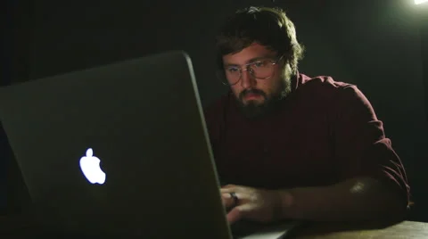 Man hacking at computer Stock Footage 44350838
