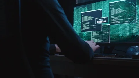 Man Hacking a Computer At Night Stock Footage 125097484