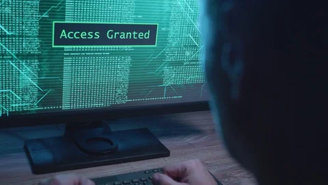 Man Hacking a Computer At Night Stock Footage 125098228
