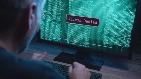 Man Hacking a Computer At Night Stock Footage 125098271