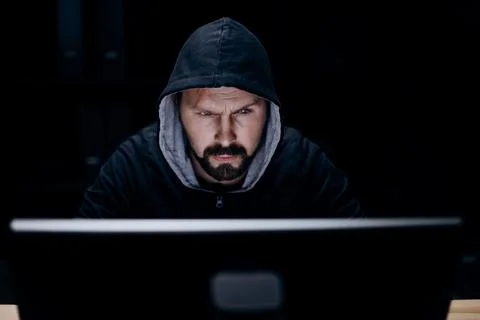 Man hacking computer systems Stock Photos