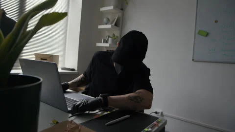 Man Hacking Office Laptop Using Hard Drive while Stealing Corporate Data Stock Footage 313550263