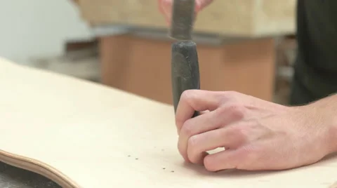 Man hammering spots for drill Stock Footage 58302379