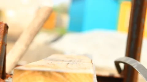 Man hammers a nail into a plank, close-up Stock Footage 49941484