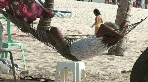 Man in hammock Stock Footage 628454
