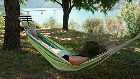 Man on hammock. Stock Footage 202074129