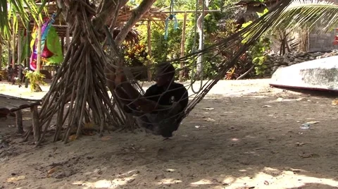 Man in Hammock Swinging Video stock 46224657